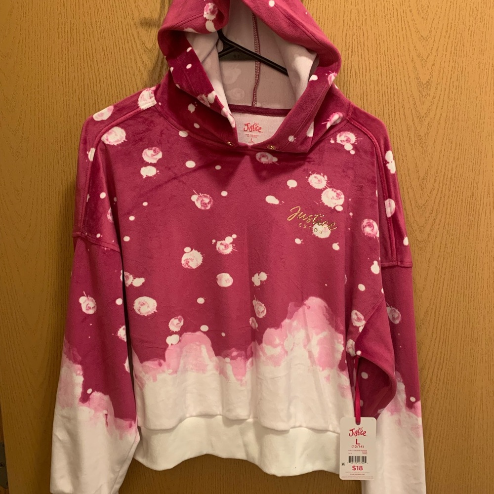 Brand new. Justice girls hoodie. Large.